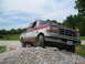 1979 Ford F-150 - This Ford pickup truck is driving over a pile of gravel on a sunny day.