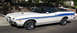 1972 Ford Ranchero - White 1972 Ford Ranchero GT with blue racing stripes parked curbside.