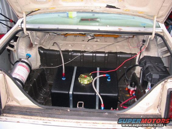 1985 Ford Crown Victoria LTD trunk with aftermarket fuel cell, nitrous oxide bottle, and battery box
