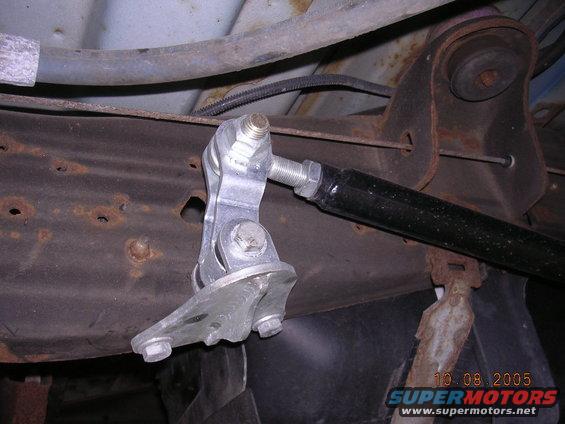 Rear suspension adjustable link on rusty frame