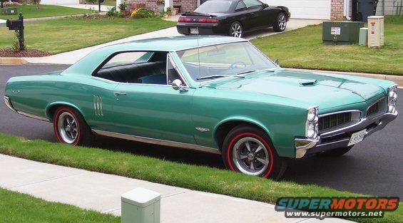 Green 1967 Pontiac Lemans coupe, 3q-front view