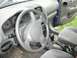 1999 Ford Taurus - Interior view of a Hyundai vehicle, showing the steering wheel, instrument cluster, and gear shifter.