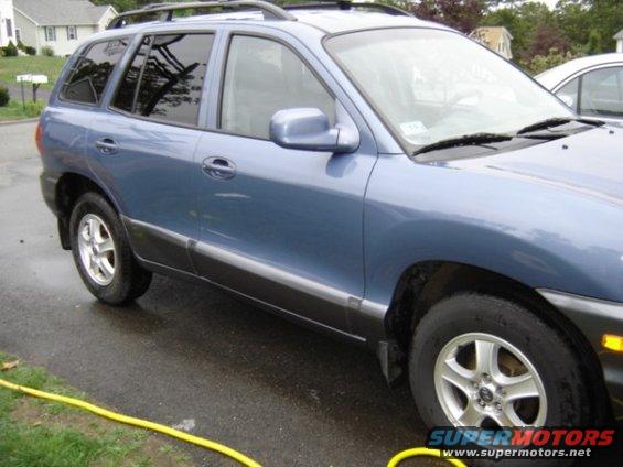 Blue SUV side view, circa 2001
