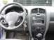 1999 Ford Taurus - Dashboard and steering wheel of a Hyundai Santa Fe, likely from the early 2000s.