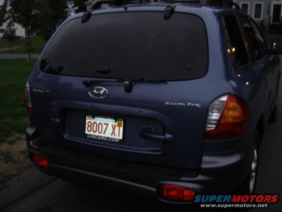 Blue Hyundai Santa Fe rear view, license plate 8007 XT