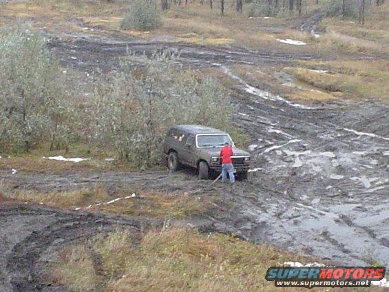 Heres where I was stuck in a rut in the front across both tires.  Im jacking it up to put some wood under the tires.