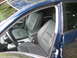 2005 Nissan Maxima - Interior view of a blue car, showing the front seats and dashboard details.