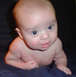 1981 Ford Bronco - Baby looking at the camera with a watermark in the corner.