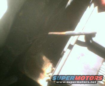 close-up of a rusty wire harness, possibly from a vehicle