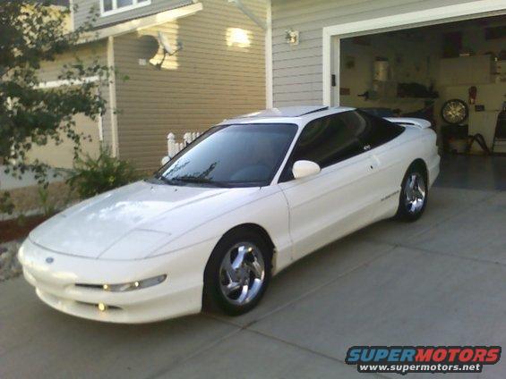 White 1996 Ford Probe coupe with sunroof parked in driveway