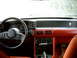 1989 Ford Mustang - No radio. But, I found a pony for the dash!