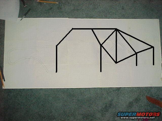 Outline of a vehicle's rear section with a roll cage diagram drawn over it on paper