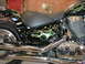1998 Suzuki VL 1500 Intruder Classic - Motorcycle with custom green flame paint job on a black body, viewed from the side.