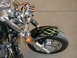 1998 Suzuki VL 1500 Intruder Classic - A motorcycle's front fender displays custom green pinstriping over a black base coat.