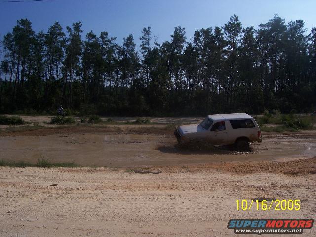 Bearfoot25 playing in the mud