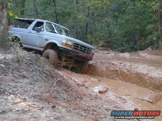 Johnski getting into a soupy off camber mud pit.