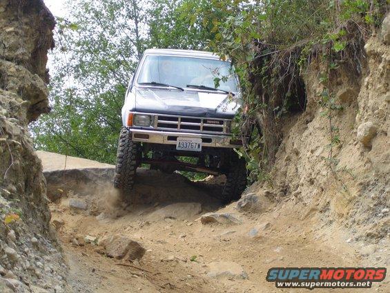 Toyota 4Runner navigating a rocky off-road trail, front view