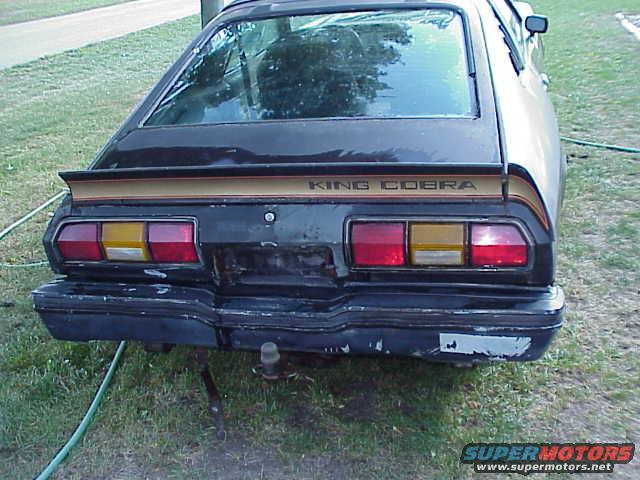 Rear view of a 1978 Ford Mustang II King Cobra with a spoiler and "KING COBRA" text on the trunk lid