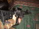 1988 Ford Bronco - A close-up view of an assault rifle, with two magazines visible in the background.