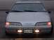 1994 Ford Thunderbird - Front view of a silver car with a hood ornament and Texas license plate.