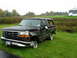1994 Ford Bronco - This Ford Bronco has significant front-end damage and is missing a front wheel.