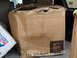 1999 Mitsubishi 3000GT - Several damaged cardboard boxes are visible inside a vehicle's cargo area.