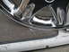 1999 Mitsubishi 3000GT - The long thin strip under the edge of the rim is a peice of chrome that came off. It is peeling off in chunks.
