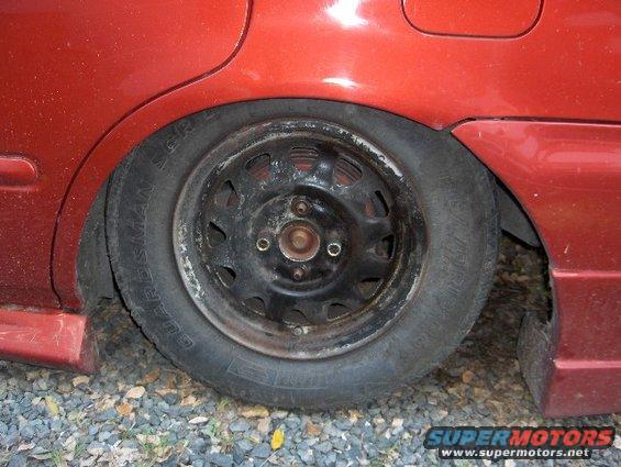 Red car rear wheel with steel rim