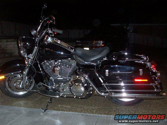 2005 Harley-Davidson FLH motorcycle parked at night
