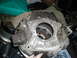 1979 Ford Bronco - This is a close-up view of a transmission bell housing, a component of a vehicle's drivetrain.