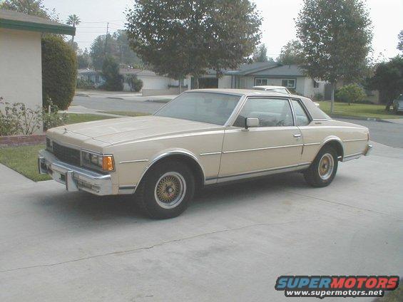 Tan 1978 Chevrolet Caprice coupe parked on driveway, 3q front view