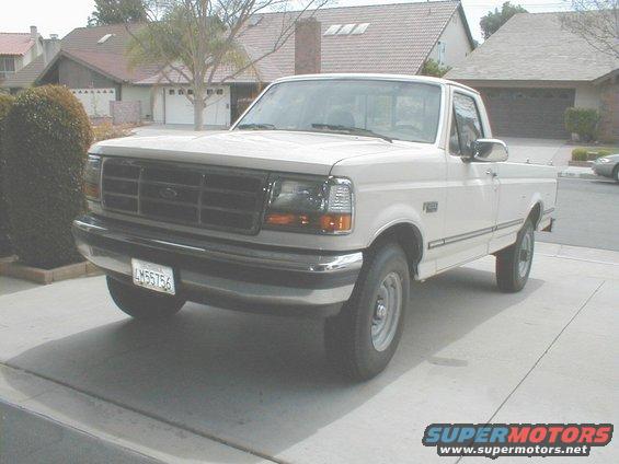 1992 Ford F-250 pickup truck parked in a driveway