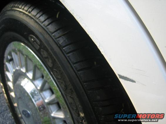 Paint chip near wheel on back passanger side.