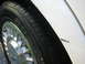 1999 Ford Crown Victoria - Paint chip near wheel on back passanger side.
