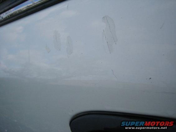 Small scratches where touch up paint was used.