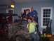 1994 Ford Bronco - Friends celebrate around a disassembled vehicle, possibly during a project or event.