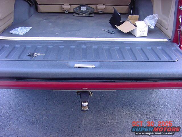 1989 Ford Bronco tailgate open, showing cargo area with keys and parts. Date stamp reads OCT 30 2005