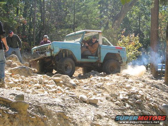 img_6370.jpg He's giving it hell, but in the end snapped an outter axle shaft up front.  He ended up winching up most of the rest of Daniel.  Unfortunately, the broken shaft also repeatedly kept binding up his steering, so he had to bow out early.  