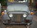 1973 Jeep CJ5 - This Jeep CJ shows a classic front-end design with its iconic grille and round headlights.