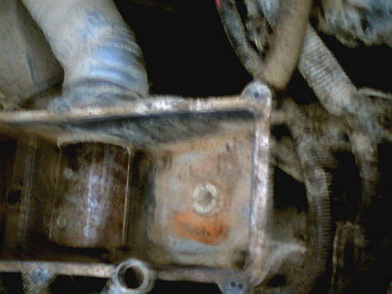 This is the modification to the air box
a piece of 3" exhaust pipe bolted in and a cover for the stock intake

