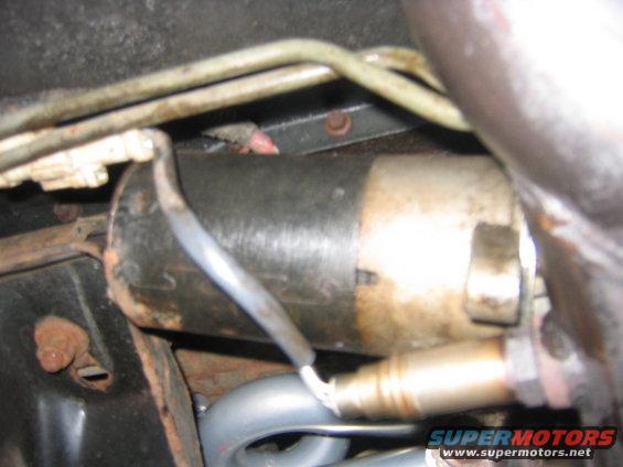 Now unbolt the starter, you can just set it on the exhaust or something, just as long as it doesn’t hang by the wires. 