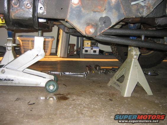 img_2638.jpg At this point I was taking the tranny out for the first time using a method I DO NOT recommend, I will show it to you guys just for learning sake, and maybe some of you will make it work but this began a long chain of screw ups so watch and learn.  At this point I supported the tranny with my floor jack.