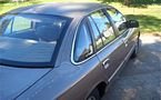 Gray 1992 Ford Crown Victoria, rear passenger side view