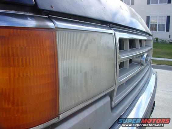 1988 Ford Bronco front corner with chrome grille and amber turn signal