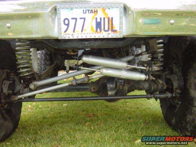 Here the front, dual shock steering stabalizer, superlift adjustable track bar with track bar drop bracet, super lift adjustable drag link with drop pitmen arm, new tierod, 1" coil shims, new procomp shocks, and extended brake lines.
Axle has all new seals and bearings and new ball joints, Has new poly 7* radius arm and track bar bushings