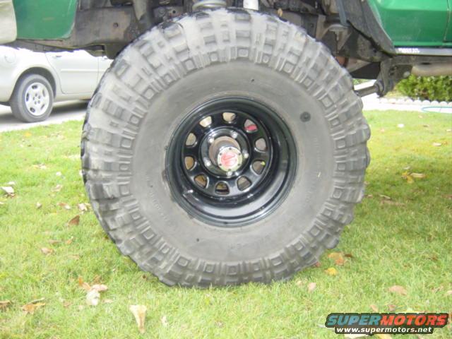 Black wheels 38" swampers.