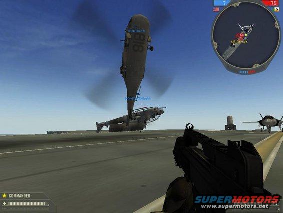 Video game scene showing a helicopter in flight, a jet on the runway, and a gun in the foreground