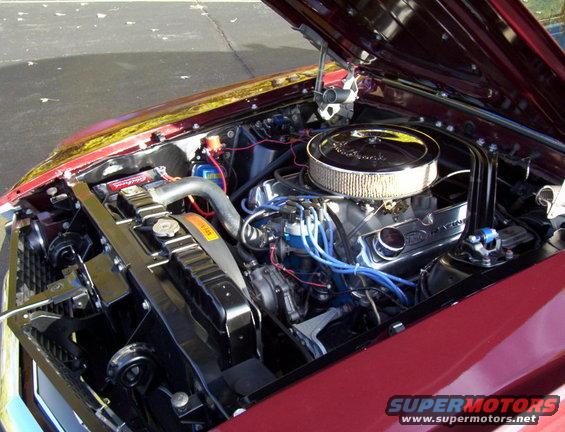 1969 Ford Mustang engine bay with chrome air cleaner and V8 engine