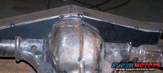 Close-up of a welded metal plate on top of a differential housing