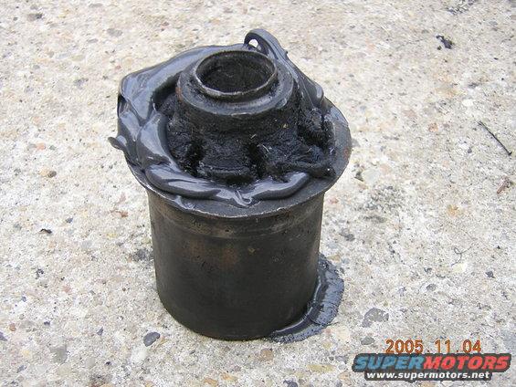 goop on the rtv generously and fill the inside as well, you do not want any air gaps where the bushing would work itself loose again